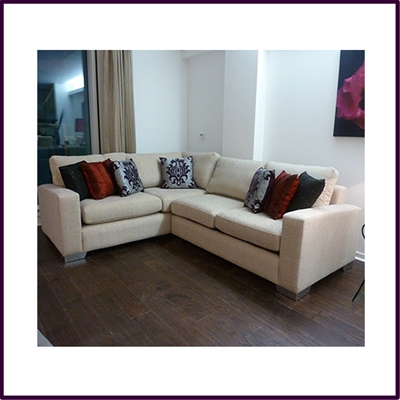 Stylish 'Mobus' corner sofa in beige fabric